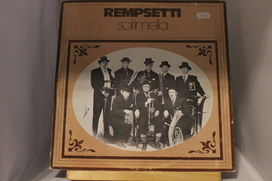 Remsetti soittimella lp-levy