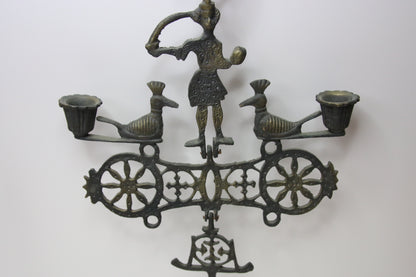 Bysanttilaistyylinen valurauta seinäkynttelikkö