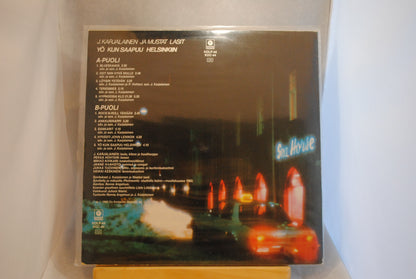 J Karjalainen ja Mustat Lasit Yö kun saapuu Helsinkiin Lp-levy